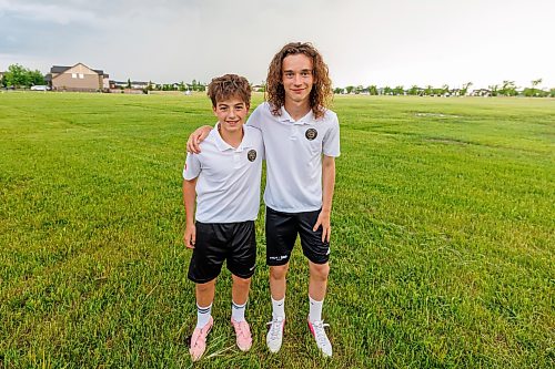 MIKE DEAL / FREE PRESS
(From left) Aiden Karacsony and Cristiano Morais were selected to carry the match ball during a pair of World Cup games.
Reporter: Josh Frey-Sam
260610 - Wednesday, June 10, 2026.