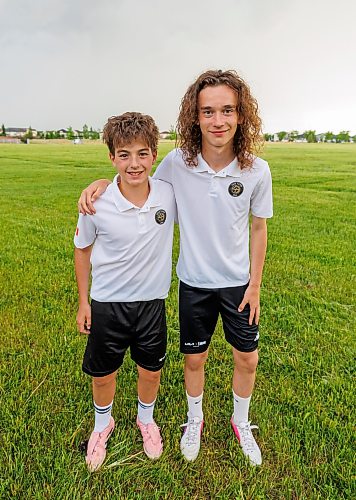 MIKE DEAL / FREE PRESS
(From left) Aiden Karacsony and Cristiano Morais were selected to carry the match ball during a pair of World Cup games.
Reporter: Josh Frey-Sam
260610 - Wednesday, June 10, 2026.