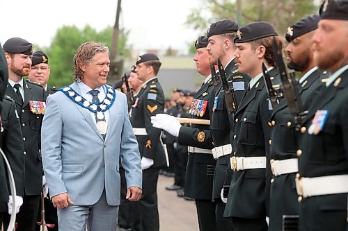 Brandon Mayor Jeff Fawcett inspects soldiers with the 1st Regiment, Royal Canadian Horse Artillery during the Freedom of the City ceremony in front of Brandon City Hall on 9th Street on Thursday morning. See story on Page A4. (Tim Smith/The Brandon Sun)