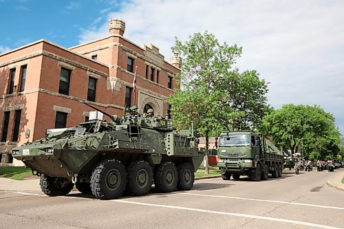 11062026
Soldiers with the Royal Canadian Artillery Band and the 1st Regiment, Royal Canadian Horse Artillery march along Victoria Avenue from Brandon University to Brandon City Hall led by an armoured vehicle during the Freedom of the City parade and ceremony on Thursday morning.
(Tim Smith/The Brandon Sun)