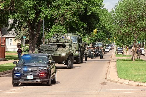 11062026
Soldiers with the Royal Canadian Artillery Band and the 1st Regiment, Royal Canadian Horse Artillery march along Victoria Avenue from Brandon University to Brandon City Hall during the Freedom of the City parade and ceremony on Thursday morning.
(Tim Smith/The Brandon Sun)
