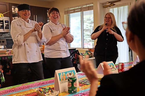 Chef Oksana Maksymiv, centre, is applauded for her contributions to Thursday’s annual “Chef Showdown” at Riverheights Terrace. (Jae Murray/The Brandon Sun)