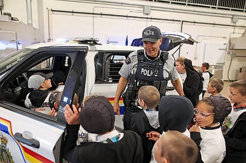 12062026
Cst. Terry Fehr with the Neepawa RCMP detachment talks about his roll as an RCMP officer during Colony Safety Day at Rolling Acres Hutterite Colony near Eden, Manitoba on Friday.   (Tim Smith/The Brandon Sun)