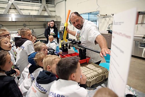 12062026
Michael Waldner of Deerboine Colony teaches gun safety during Colony Safety Day at Rolling Acres Hutterite Colony near Eden, Manitoba on Friday.   (Tim Smith/The Brandon Sun)