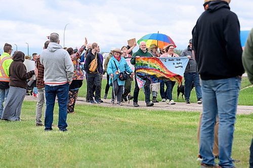 Mike Sudoma/Free Press
Hundreds of Manitobans march past a small group of protesters as they take part in Winkler Manitobas first official Pride March Saturday afternoon
June 13, 2026