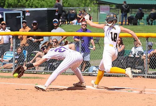 Westman Magic base runner Rachel Lyver arrives at the bag as Twin City Angels first baseman Eabha Anderson stretches to catch a wide throw during the Wheat City Classic's under-17 bronze medal game against the Twin City Angels at the Ashley Neufeld Softball Complex on Sunday. Despite her best efforts, the ball squirted out the end of Anderson's glove and Lyver was safe on the play. (Perry Bergson/The Brandon Sun)
June 14, 2026