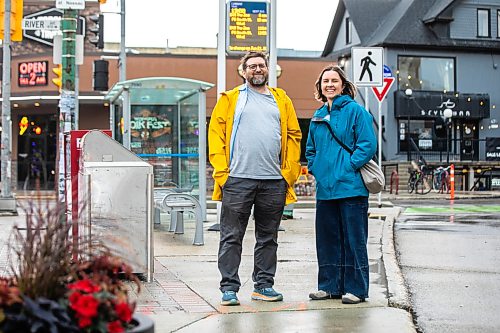 MIKAELA MACKENZIE / FREE PRESS
	
Musician John Samson Fellows and Laura Cameron from Climate Action at an Osborne Village bus stop on Monday, June 15, 2026. John Samson Fellows has released a new song calling on the provincial government to reinstate 50/50 funding for Winnipeg Transit, in support of a public transportation funding campaign led by Climate Action Team Manitoba and the Amalgamated Transit Union.

For Eva story.
Free Press 2026