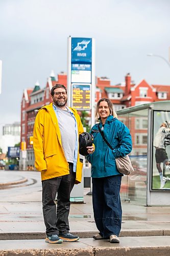 MIKAELA MACKENZIE / FREE PRESS
	
Musician John Samson Fellows and Laura Cameron from Climate Action at an Osborne Village bus stop on Monday, June 15, 2026. John Samson Fellows has released a new song calling on the provincial government to reinstate 50/50 funding for Winnipeg Transit, in support of a public transportation funding campaign led by Climate Action Team Manitoba and the Amalgamated Transit Union.

For Eva story.
Free Press 2026