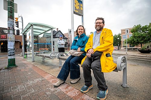 MIKAELA MACKENZIE / FREE PRESS
	
Musician John Samson Fellows and Laura Cameron from Climate Action at an Osborne Village bus stop on Monday, June 15, 2026. John Samson Fellows has released a new song calling on the provincial government to reinstate 50/50 funding for Winnipeg Transit, in support of a public transportation funding campaign led by Climate Action Team Manitoba and the Amalgamated Transit Union.

For Eva story.
Free Press 2026