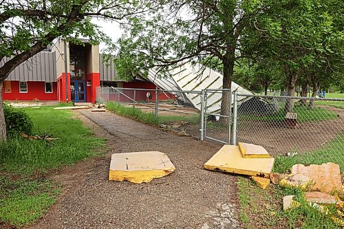 15062026
A portion of the roof of Sioux Valley Elementary School at Sioux Valley Dakota Nation lies on playground equipment along with other debris on Monday. The school was heavily damaged in a storm on June 6th forcing the cancellation of classes for the approximately 340 kindergarten - grade eight students, just a few weeks before the end of the school year. 
(Tim Smith/The Brandon Sun)
