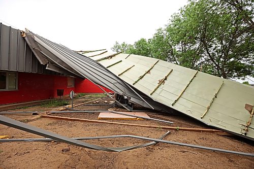 15062026
A portion of the roof of Sioux Valley Elementary School at Sioux Valley Dakota Nation lies on playground equipment along with other debris on Monday. The school was heavily damaged in a storm on June 6th forcing the cancellation of classes for the approximately 340 kindergarten - grade eight students, just a few weeks before the end of the school year. 
(Tim Smith/The Brandon Sun)
