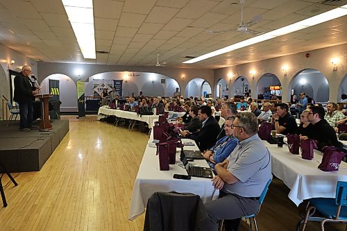 Municipal leaders listen to Melita Mayor Bill Holden at the Legion Memorial Hall in Melita on Tuesday. (Alex Lambert/The Brandon Sun)