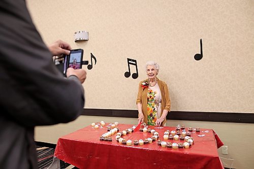 16062026
Edith Edmundson poses for photos with her birthday cupcakes during her 105th birthday celebration at the Victoria Inn in Brandon, Manitoba on Tuesday. Edmundson turned 105 on June fourth and is celebrating her birthday four times. Festivities started last week in B.C. where Edmundson has been living with her daughter Rhonda Kremko for the last four years. Last Saturday friends and relatives raised a glass to her in Shoal Lake. Her fourth party will be this weekend in Winnipeg. (Tim Smith/The Brandon Sun)