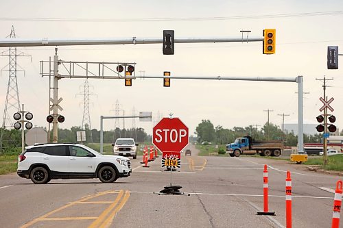 16062026
Traffic uses the four way stops at the intersection of Richmond Avenue and Provincial Trunk Highway 110 on Tuesday afternoon. (Tim Smith/The Brandon Sun)