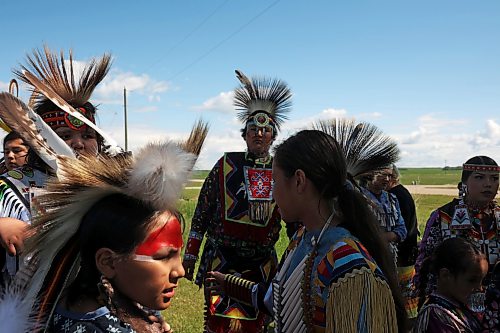 17062026
Young dancers wait to take part in the grand entry for Chan Kagha Otina Dakota Wayawa Tipi School’s annual end-of-year Pow wow at Birdtail Sioux Dakota Nation on Wednesday. The event included a lunch and prizes in various pow wow categories. Chan Kagha Otina Dakota Wayawa Tipi School has approximately 210 students from nursery school up to adult education. School principal Delonna Pratt said the annual pow wow is “a celebration of the school year and coincides with the upcoming summer solstice.” She added “in Dakota Culture there is a lot of connection to the earth so we make sure to give our thanks to creator every day for what we have.” (Tim Smith/The Brandon Sun)