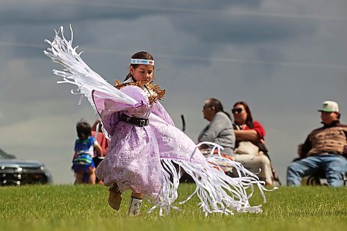 17062026
Grade two student Meadow Standingready, seven, dances in the fancy shawl category during Chan Kagha Otina Dakota Wayawa Tipi School’s annual end-of-year Pow wow at Birdtail Sioux Dakota Nation on Wednesday. The event included a lunch and prizes in various pow wow categories. Chan Kagha Otina Dakota Wayawa Tipi School has approximately 210 students from nursery school up to adult education. School principal Delonna Pratt said the annual pow wow is “a celebration of the school year and coincides with the upcoming summer solstice.” She added “in Dakota Culture there is a lot of connection to the earth so we make sure to give our thanks to creator every day for what we have.” (Tim Smith/The Brandon Sun)