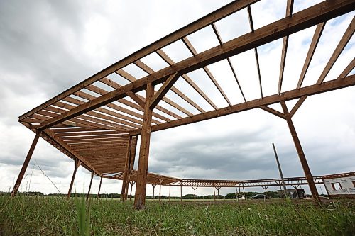 17062026
The under-construction Pow wow arbor at Birdtail Sioux Dakota Nation on Wednesday. The Dakota Nation will host their first community pow wow in years at the end of August at the site of the new arbor. (Tim Smith/The Brandon Sun)