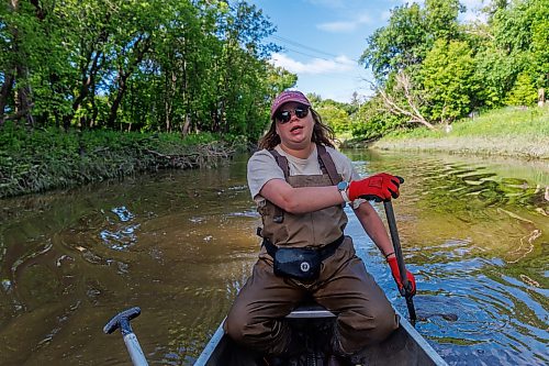 MIKE DEAL / FREE PRESS
Monique Ellison, Summer Team Coordinator with the Save Our Seine cleanup crew, steers the canoe Thursday morning. The crew of usually three is out most nice days paddling their way along the Seine River filling up their canoe with heaps of garbage. The portion of the Seine River in the city they are charged with protecting is about 26kms long and they will cover that distance at least four times during the next few months removing garbage and making sure the river is kept as healthy as possible.
Every day they are in the river they collect about truck load of garbage, sometimes two loads depending on the stretch of the river they are canoeing that day.
260618 - Thursday, June 18, 2026.