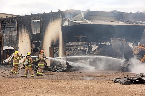 18062026
Firefighters from the Oakland-Wawanesa Fire Department, the Souris-Glenwood Fire Department and Green Acres Colony worked to put out a fire that destroyed the colony’s garage next to their mechanic shop and several vehicles on Thursday. The fire spread through the garage quickly. Several members of the colony are part of the Oakland-Wawanesa Fire Department.
(Tim Smith/The Brandon Sun)