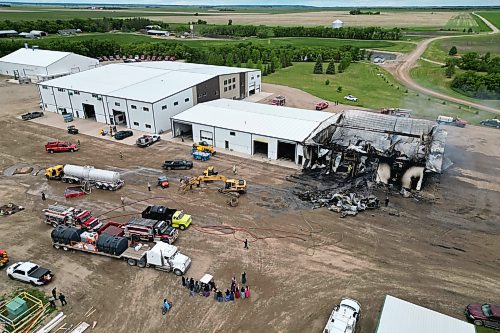18062026
Firefighters from the Oakland-Wawanesa Fire Department, the Souris-Glenwood Fire Department and Green Acres Colony work to put out a fire that destroyed the colony’s garage next to their mechanic shop and several vehicles on Thursday.
(Tim Smith/The Brandon Sun)