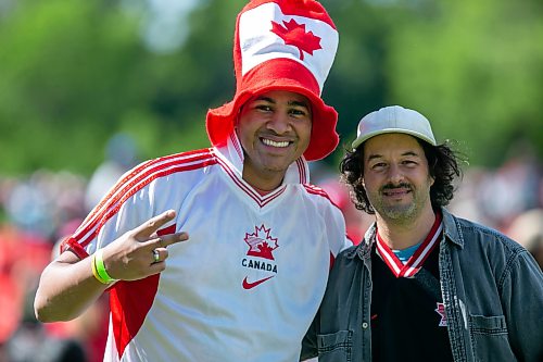 BROOK JONES/FREE PRESS
The Assiniboine Park Conservancy hosts an outdoor watch party of the 2026 FIFA World Cup match between Canada and Qatar on a  giant screen at the Lyric Theatre at Assiniboine Park in Winnipeg, Man., Thursday, June 18, 2026. Pictured: Soccer fans Brian Triminio, 34, and Jackson Grier, 44, attend the watch party.