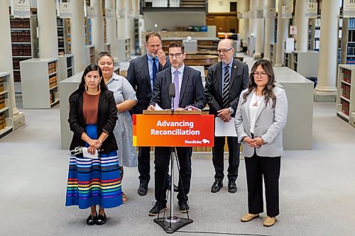 MIKE DEAL / FREE PRESS
Chief Judge Ryan Rolston, provincial court of Manitoba, announces that Judge Jerilee Ryle (left) has been appointed Manitoba’s first associate chief judge of reconciliation, during a press conference in the Grand Law Library at 408 York Ave, Friday morning.
Other vip’s in attendance were Mike Moroz (second from right), Minister of Innovation and New Technology, Melissa Brown (behind Judge Ryle), Justice Manager at MKO, and Crystal Brown (right), Director of Justice and Rights SCO.
Reporter: Dean Pritchard
260619 - Friday, June 19, 2026.