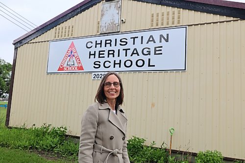 Christian Heritage School principal Raquel Peters stands in front of the school building on Friday. Peters says the school, which currently serves approximately 110 students from kindergarten to Grade 8, plans to gradually re-establish a full high school program by adding one grade each year until Grades 10, 11 and 12 are in place. (Abiola Odutola/The Brandon Sun)