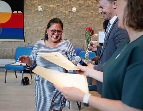 Ruth Bonneville / Free Press

LOCAL - SHELTER U GRAD

Princess Nakpil receives her graduation certificate from Seyward Goodhand, the creative writing instructor and Aaron Klassen, Shelter U program director, in the chapel at the Salvation Army Thursday. 

Shelter U, a post-secondary institute with a mandate to recruit students experiencing poverty and searching for stable housing, celebrated the end of its pilot with a ceremony for its fourth batch of certificate graduates recently.  Booth University College launched the project last winter, working alongside the Salvation Army.  Thursday's certificate ceremony/graduation is celebrating the final group of graduates to participate in the pilot program its founder hopes will continue long into the future. 

See story by MAGGIE

June 18, 2026