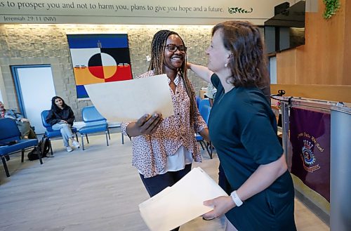 Ruth Bonneville / Free Press

LOCAL - SHELTER U GRAD

Edith Aibangbee from Nigeria, receives her graduation certificate from Seyward Goodhand, the creative writing instructor and Aaron Klassen, Shelter U program director, in the chapel at the Salvation Army Thursday. 

Shelter U, a post-secondary institute with a mandate to recruit students experiencing poverty and searching for stable housing, celebrated the end of its pilot with a ceremony for its fourth batch of certificate graduates recently.  Booth University College launched the project last winter, working alongside the Salvation Army.  Thursday's certificate ceremony/graduation is celebrating the final group of graduates to participate in the pilot program its founder hopes will continue long into the future. 

See story by MAGGIE

June 18, 2026