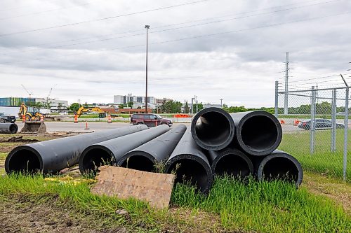 MIKE DEAL / FREE PRESS
Large sewer pipes wait to be attached to each other before they will be hauled from the western to the eastern side of the Red River through a tunnel that goes underneath the river.
Construction continues on replacing the old failed sewer lines that crossed the Red River at the Fort Garry Bridge, the new ones being installed in a tunnel that goes 16 meters below the ground travelling underneath the river.
Reporter: Morgan Modjeski
260619 - Friday, June 19, 2026.
