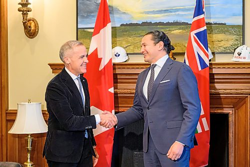 Mike Sudoma/Free Press
Prime Minister Mark Carney and Manitoba Premier Wab Kinew shake hands during a visit to the Manitoba Legislature Sunday afternoon 
November 16, 2025


