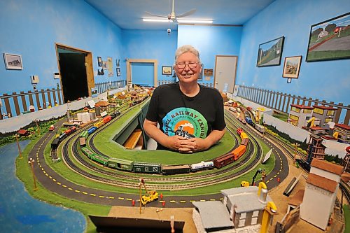 Stan Peck stands in the model railway exhibit at the Irvin Goodon International Wildlife Museum in Boissevain. Peck was named volunteer of the year in the 2026 Tribute to Tourism awards hosted by Tourism Westman in June for his work in the exhibit. Peck has spent years helping to relocate and reassemble a model train track built by the late Earl Patterson, who handcrafted replica landmarks such as the Brandon Generating Station and incorporated them into a diorama with remote trains. (Connor McDowell/The Brandon Sun)