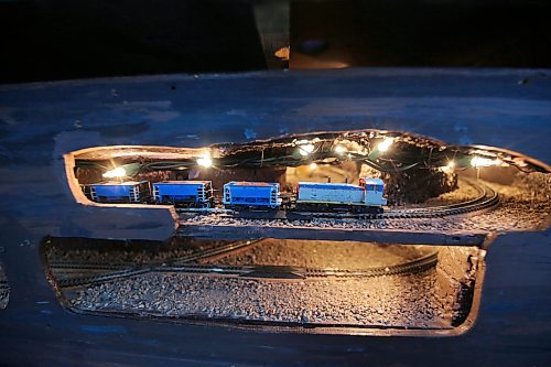 A model of the underground Flin Flon mine is seen below a surface-level group of buildings built by the late Earl Patterson. Stan Peck has helped to fix the lights after transporting and reassembling the feature as part of a larger railway exhibit in Boissevain over the past number of years. (Connor McDowell/The Brandon Sun)