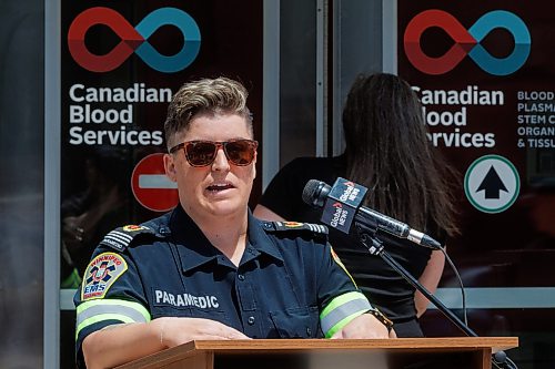 MIKE DEAL / FREE PRESS
WFPS paramedic Jamie McClintock speaks during the event.
To kickoff the SIRENS FOR LIFE campaign blood donation drive, members of the WFPS take the time to donate Monday afternoon.
During the kickoff event which took place in front of Canadian Blood Services at 777 William Avenue, Chief of Police Gene Bowers, Chief of Fire Paramedic Service Christian Schmidt, RCMPs Derek Inglis, Aide-de-Camp for Lt.-Gov. Anita Neville, and Paramedic Jamie McClintock spoke about the importance of donating blood.
Reporter: Maggie Macintosh
260622 - Monday, June 22, 2026.