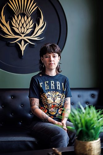 MIKE DEAL / FREE PRESS
Justine Proulx at the Black Thistle Tattoo parlour (853 Henderson Hwy) where she works.
Justine Proulx's clients are bringing her a lot of AI-generated art for tattoo proposals, and some of them are being made in "Justine Proulx" style.
Some prospective clients are feeding the artist's work into AI tools like ChatGPT or Gemini to create versions of tattoos in Proulx's woodlands style; the artist is having none of it.
Reporter: Ben Waldman
260623 - Tuesday, June 23, 2026.