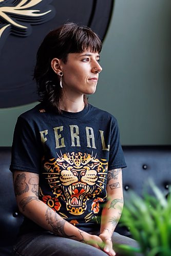 MIKE DEAL / FREE PRESS
Justine Proulx at the Black Thistle Tattoo parlour (853 Henderson Hwy) where she works.
Justine Proulx's clients are bringing her a lot of AI-generated art for tattoo proposals, and some of them are being made in "Justine Proulx" style.
Some prospective clients are feeding the artist's work into AI tools like ChatGPT or Gemini to create versions of tattoos in Proulx's woodlands style; the artist is having none of it.
Reporter: Ben Waldman
260623 - Tuesday, June 23, 2026.
