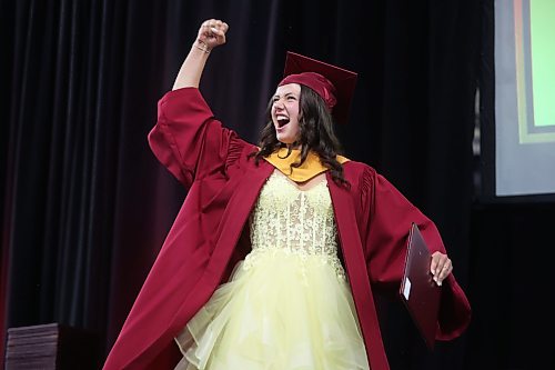 23062026
Graduate Eliza Taggart pumps her fist in celebration while receiving her diploma during the Crocus Plains Regional Secondary School Class of 2026 convocation ceremony at Assiniboine Credit Union Place on Tuesday.
(Tim Smith/The Brandon Sun)