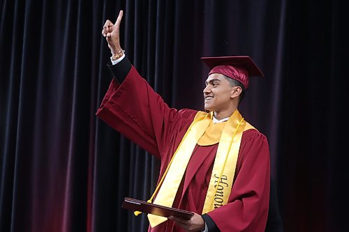 23062026
Graduate Taksh Patel celebrates while receiving his diploma during the Crocus Plains Regional Secondary School Class of 2026 convocation ceremony at Assiniboine Credit Union Place on Tuesday. 
 (Tim Smith/The Brandon Sun)