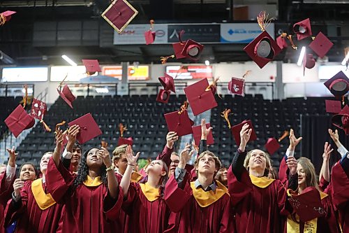 23062026
Graduates from Crocus Plains Regional Secondary School toss their mortarboards in the air following their convocation ceremony at Assiniboine Credit Union Place on Tuesday.
(Tim Smith/The Brandon Sun)