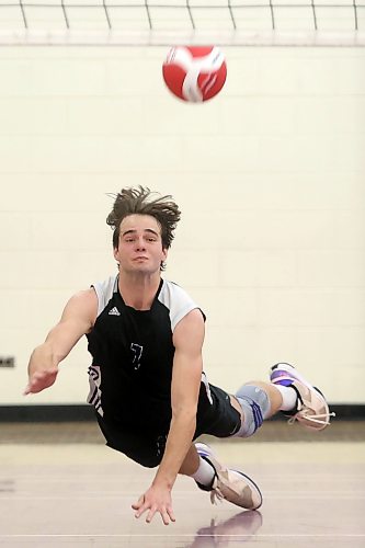 Logan Van Santen #7 of the Vincent Massey Vikings digs the ball during the Vikings match against the Steinbach Sabres in the AAAA varsity boys volleyball provincials at Vincent Massey last November. (Tim Smith/The Brandon Sun)
