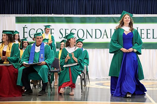 24062026
Alexis Grimeau walks up to receive her diploma during École Secondaire Neelin High School’s 2026 convocation at the Brandon University Healthy Living Centre on Wednesday. Neelin had 85 graduates.
(Tim Smith/The Brandon Sun)