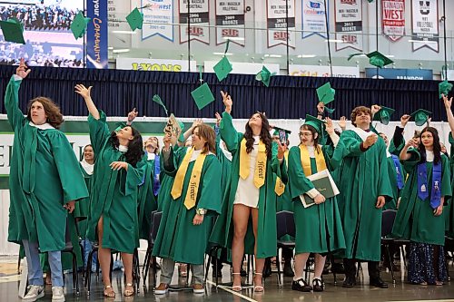 24062026
Graduates toss their mortarboards in the air at the end of École Secondaire Neelin High School’s 2026 convocation at the Brandon University Healthy Living Centre on Wednesday.
(Tim Smith/The Brandon Sun)