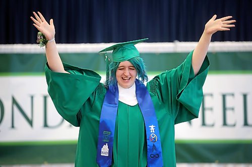 24062026
Addison Horkey celebrates while walking up to receive her diploma during École Secondaire Neelin High School’s 2026 convocation at the Brandon University Healthy Living Centre on Wednesday. Neelin had 85 graduates.
(Tim Smith/The Brandon Sun)