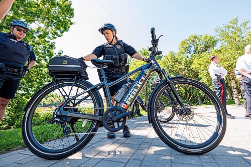 MIKE DEAL / FREE PRESS
WPS constable Emily Meronyk talks about the new e-bike and the Bicycle Patrol Program.
A handful of the twenty-five WPS officers that have completed specialized bicycle patrol training were on hand Thursday morning on Waterfront Drive for a show-and-tell of their new e-bikes and the launch of a modernized Bicycle Patrol Program.
Reporter: Erik Pindera
260625 - Thursday, June 25, 2026.