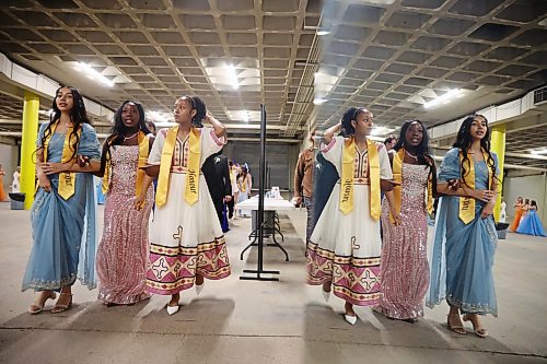 25062026
Graduates are reflected in a mirror as they line up for the grand march at the end of the Vincent Massey High School class of 2026 graduation ceremony at Assiniboine Credit Union Place on Thursday.
(Tim Smith/The Brandon Sun)