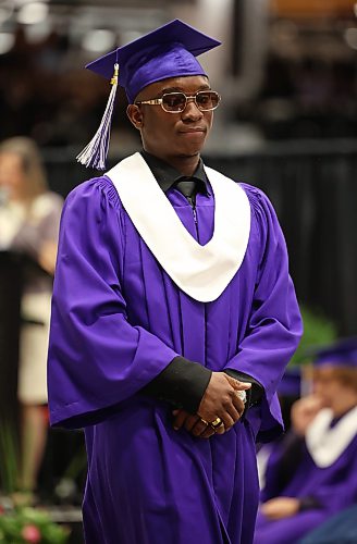 25062026
Tobi Olorunsola walks up to receive his diploma during the Vincent Massey High School class of 2026 graduation ceremony at Assiniboine Credit Union Place on Thursday.
(Tim Smith/The Brandon Sun)