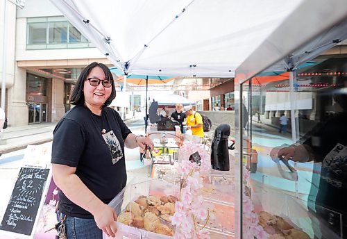 Ruth Bonneville / Free Press
Standup: Graham Farmers' Market
Yuka Katahira, owner and baker of Yuka's Japanese Bakery, displays a wide selection of freshly baked goods at her booth during the Downtown Winnipeg BIZ's popular Outdoor Farmers' Market on Graham Avenue Thursday.
The market, which has brought local food producers, artisans and vendors to downtown Winnipeg for more than 13 years at the Manitoba Hydro campus, has temporarily relocated to Graham Avenue while construction takes place around the Hydro Building.
The Downtown Winnipeg Farmers' Market is open Thursdays from 10 a.m. to 2 p.m.
June 25, 2026