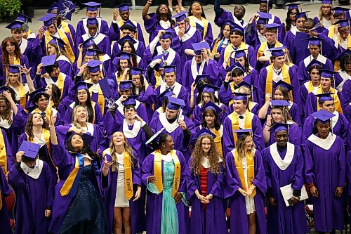 25062026
Graduates stand for applause and some throw their mortarboards at the end of the Vincent Massey High School class of 2026 graduation ceremony at Assiniboine Credit Union Place on Thursday. 
 (Tim Smith/The Brandon Sun)