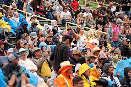 Fans brave light rain as Canadian country musician Owen Riegling performs on the main stage at Dauphin’s Countryfest 2026 on Friday evening.
(Tim Smith/The Brandon Sun)