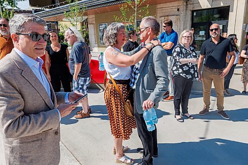 MIKE DEAL / FREE PRESS
Ginette Lavack MP for St. Boniface—St. Vital is greeted by Kevin Donnelly from True North Sports and Entertainment before the grand opening of the plaza outside the Burton Cummings Theatre named after her late husband Kevin Walters, Friday afternoon.
Standup
260626 - Friday, June 26, 2026.